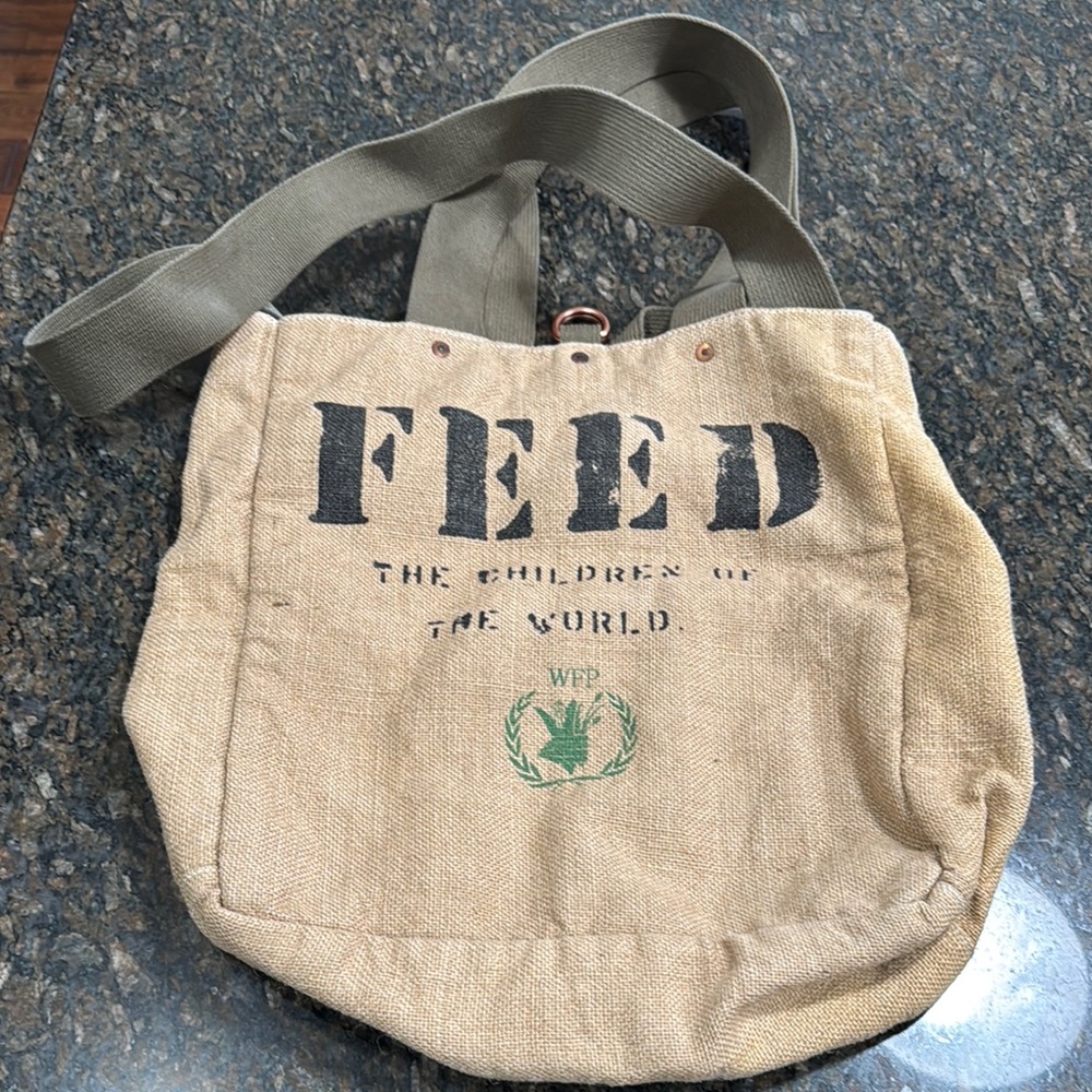 Feed The Children of the World Burlap Tote Bag.